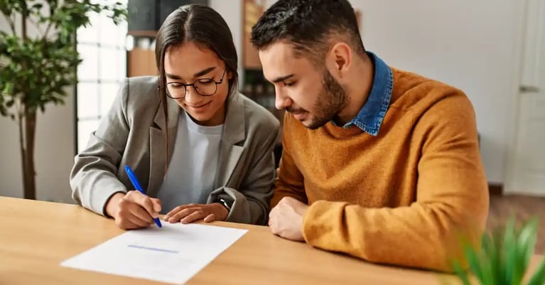 Couple looking at LRBA property expenses