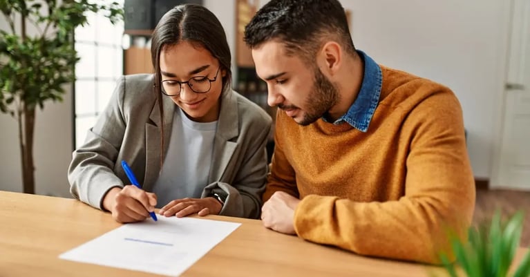 Couple looking at LRBA property expenses