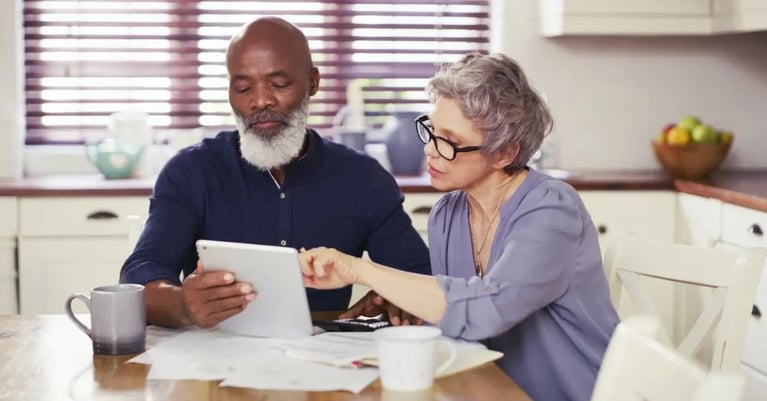 Couple looking at pension paperwork