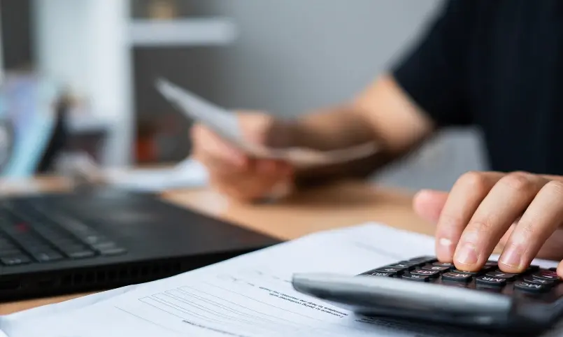 Woman looking through paperwork